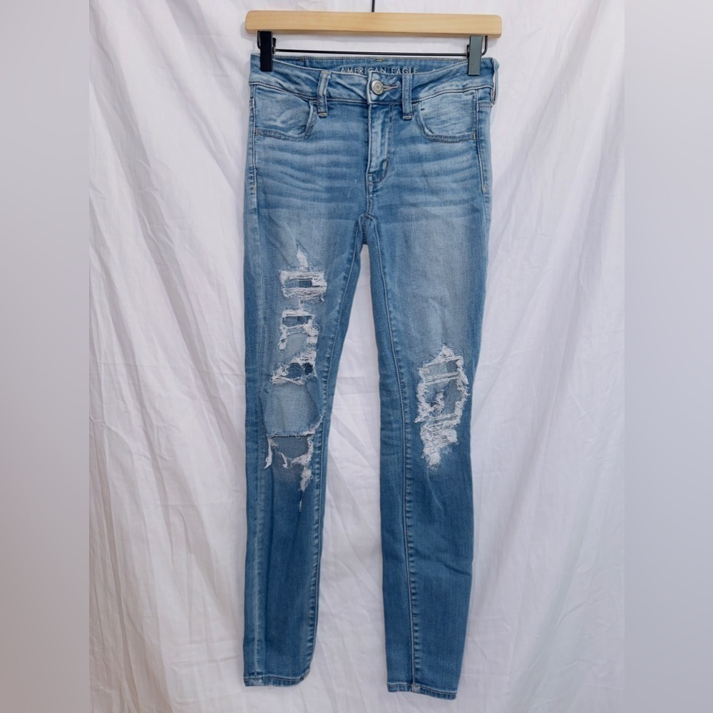 American Eagle Medium Wash Next Level Stretch Mid Rise Distressed Jegging Jean